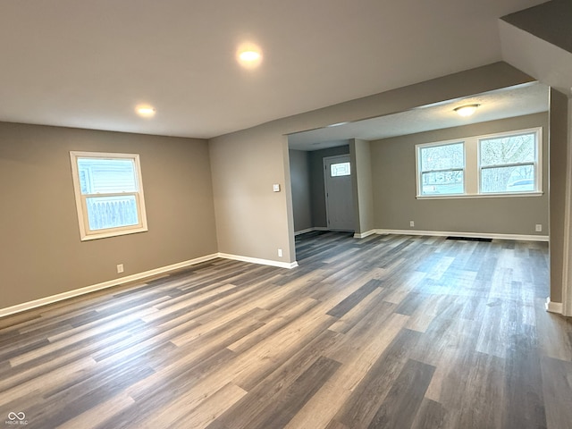 empty room featuring dark hardwood / wood-style floors