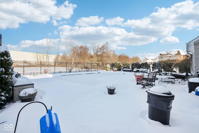 view of yard covered in snow