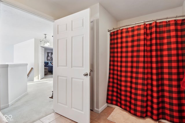 bathroom featuring tile patterned flooring