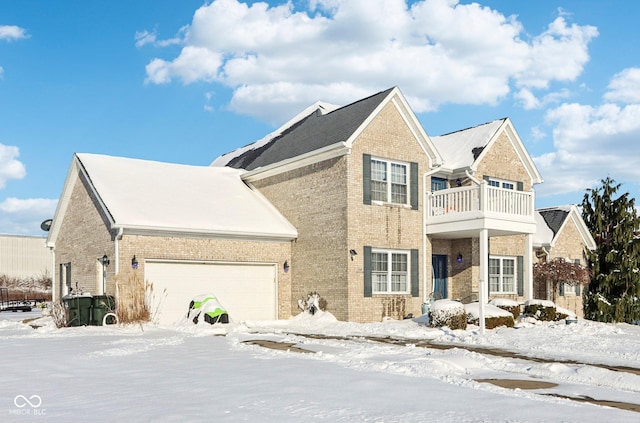 view of front of house with a balcony and a garage