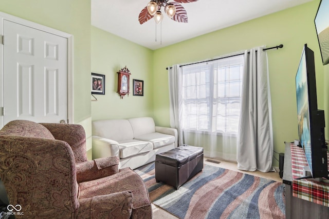 living room featuring ceiling fan