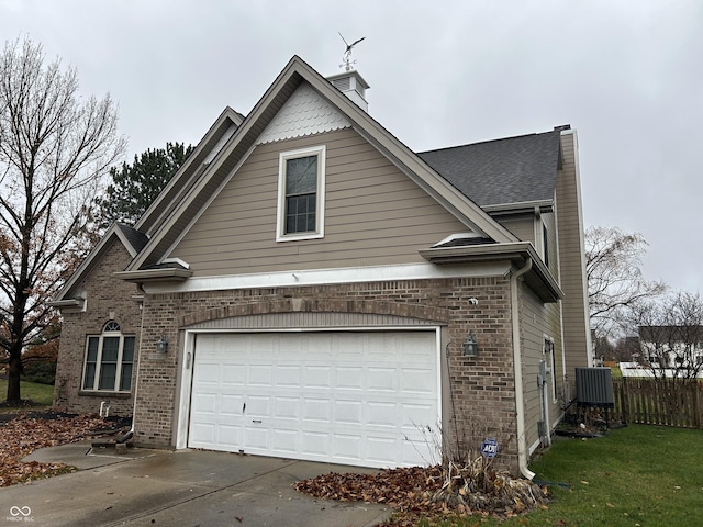 view of side of property featuring a garage