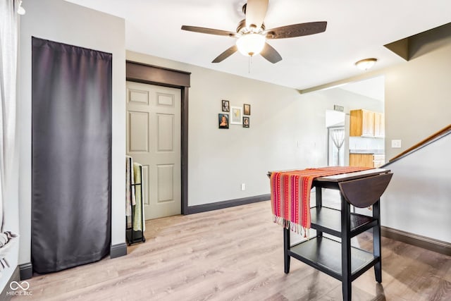 dining area featuring ceiling fan and light hardwood / wood-style flooring