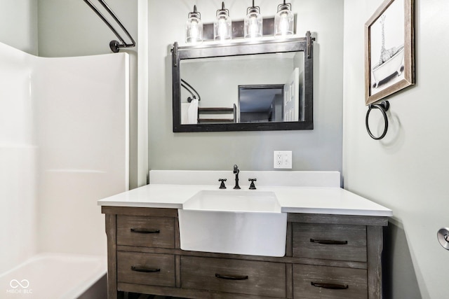 bathroom with vanity and shower / bathtub combination