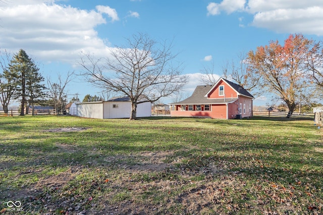 view of yard with an outdoor structure