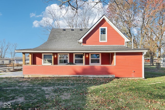 view of property exterior with a lawn