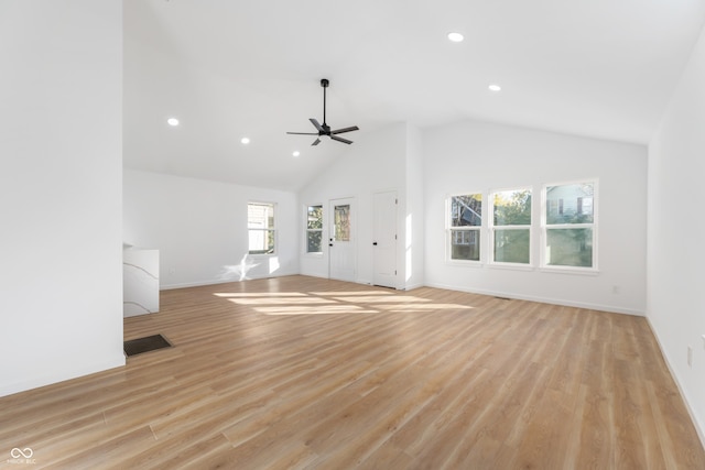 unfurnished living room featuring ceiling fan, light hardwood / wood-style flooring, high vaulted ceiling, and basketball court