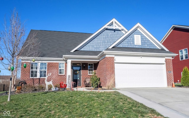 view of front of property with a front lawn and a garage