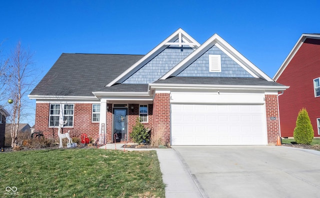 view of front of house with a front lawn and a garage