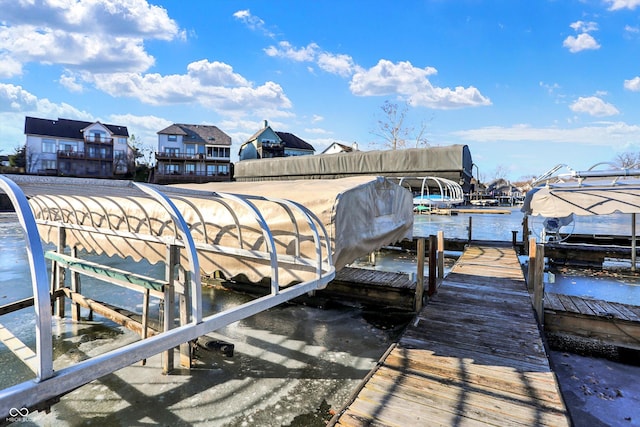 view of dock with a water view