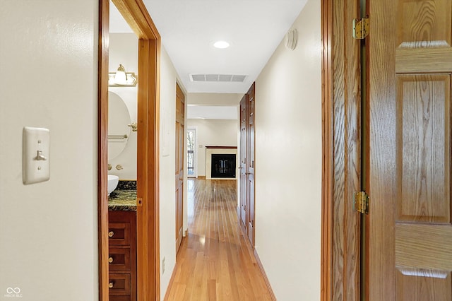 hall featuring light wood-type flooring