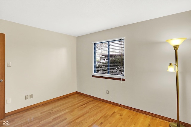 unfurnished room featuring hardwood / wood-style floors