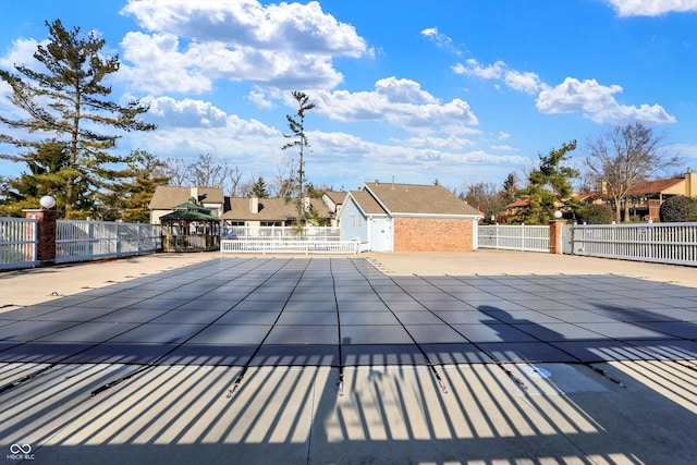 view of swimming pool featuring a patio area