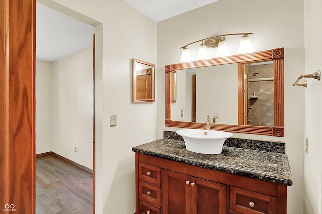 bathroom featuring vanity and hardwood / wood-style flooring