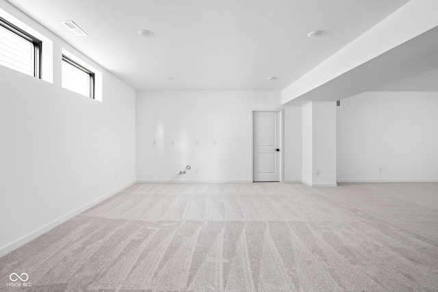 basement with light colored carpet