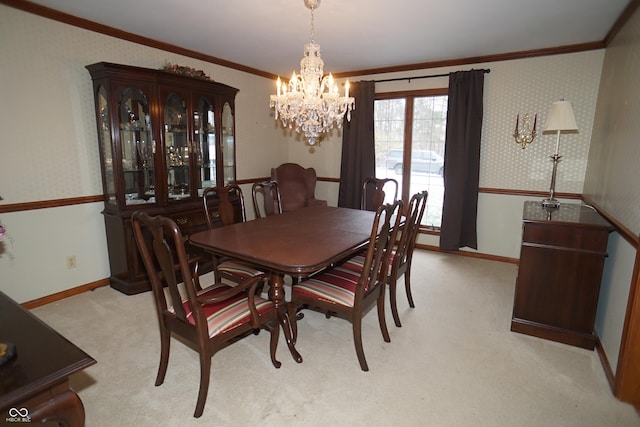 dining area featuring crown molding, light carpet, and an inviting chandelier