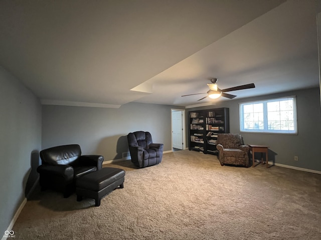 sitting room with carpet, ceiling fan, and lofted ceiling