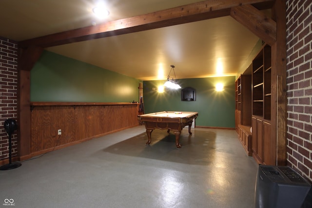 game room with brick wall, vaulted ceiling with beams, and billiards