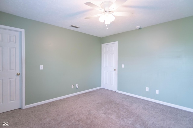 14446 Chapelwood Ln, Fishers, IN 46037 - unfurnished room featuring carpet flooring, baseboards, visible vents, and ceiling fan