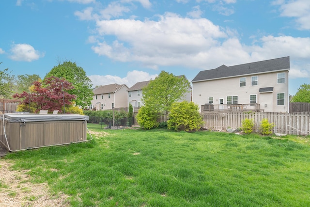 14446 Chapelwood Ln, Fishers, IN 46037 - view of yard with a fenced backyard, a hot tub, and a residential view