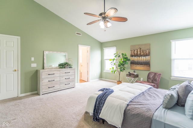 14446 Chapelwood Ln, Fishers, IN 46037 - carpeted bedroom featuring high vaulted ceiling, baseboards, ensuite bath, and visible vents