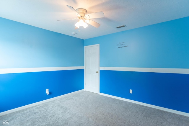 14446 Chapelwood Ln, Fishers, IN 46037 - unfurnished room featuring carpet floors, ceiling fan, baseboards, and visible vents