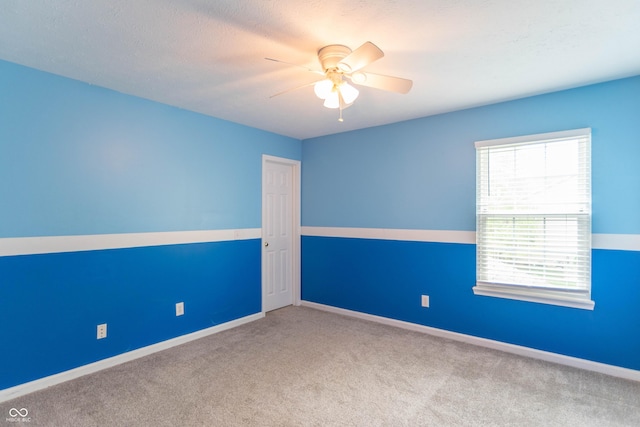 14446 Chapelwood Ln, Fishers, IN 46037 - empty room with baseboards, a ceiling fan, and carpet
