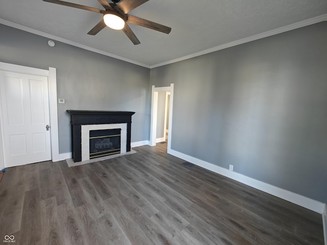 unfurnished living room with crown molding, ceiling fan, and wood-type flooring