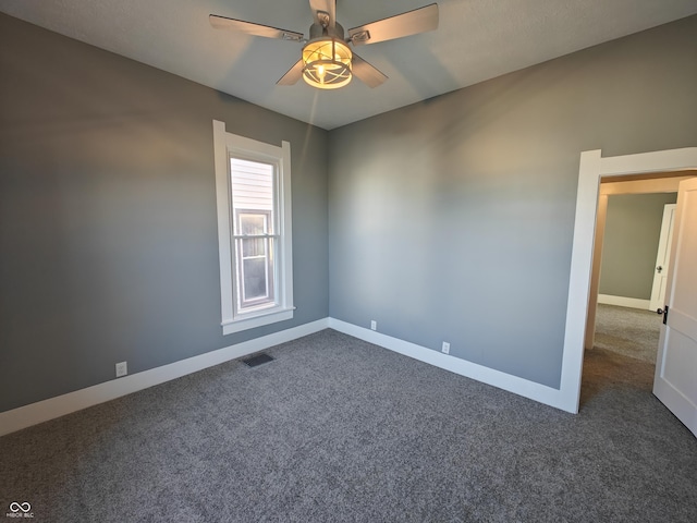 carpeted empty room with ceiling fan