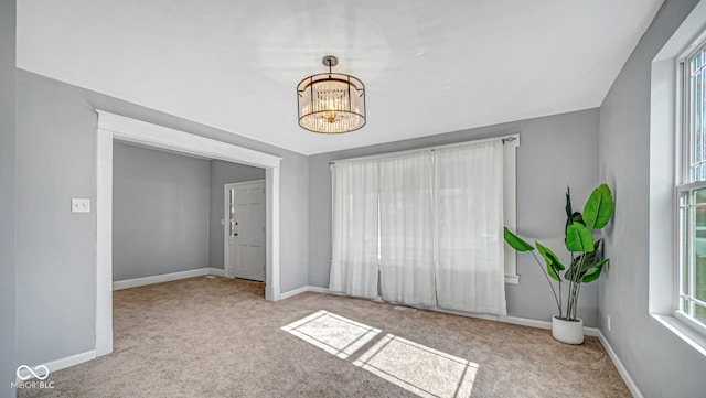 interior space featuring a notable chandelier