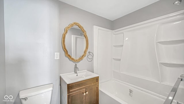 full bathroom with vanity,  shower combination, and toilet