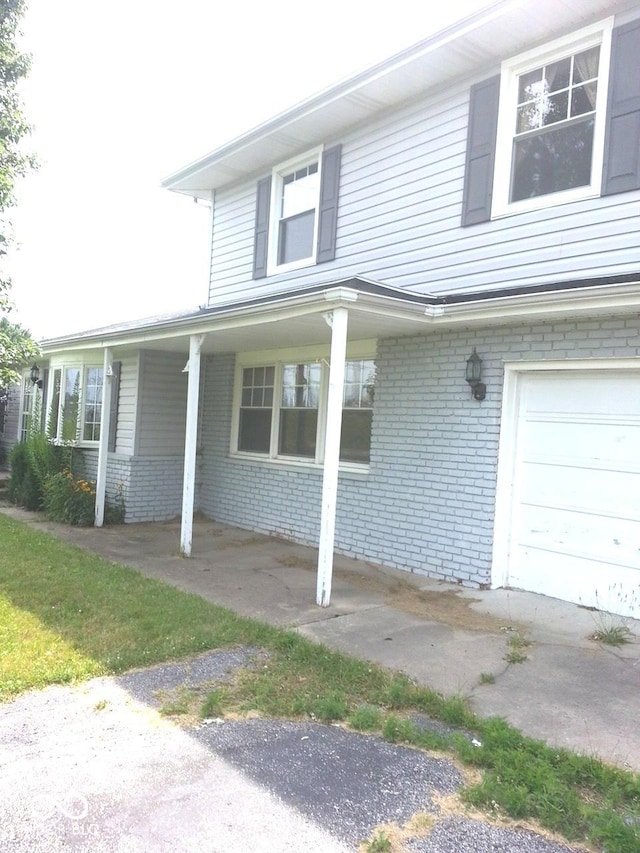 view of property exterior featuring a garage