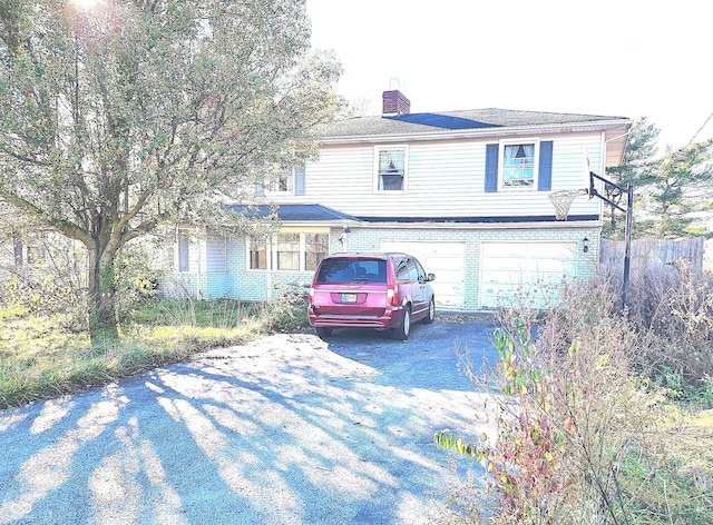 view of front property with a garage