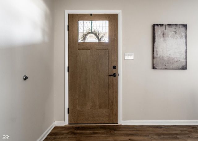 foyer entrance with dark hardwood / wood-style flooring