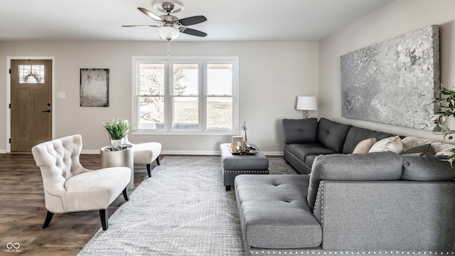 living room featuring hardwood / wood-style floors, plenty of natural light, and ceiling fan