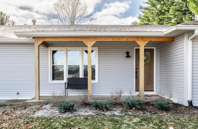 entrance to property with covered porch