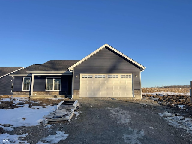 view of front of property featuring a garage