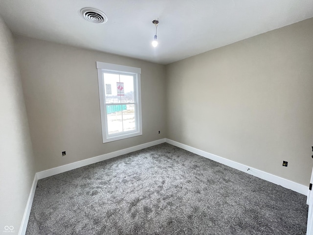 view of carpeted spare room