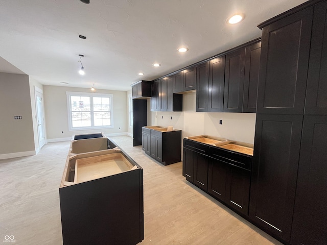 kitchen with light hardwood / wood-style floors