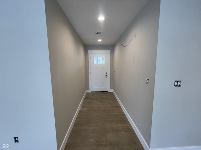 doorway featuring dark hardwood / wood-style floors