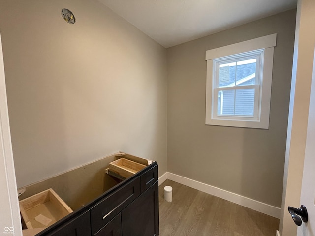 bathroom with sink and hardwood / wood-style floors