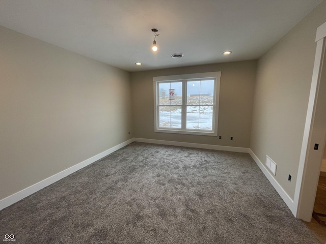 view of carpeted spare room