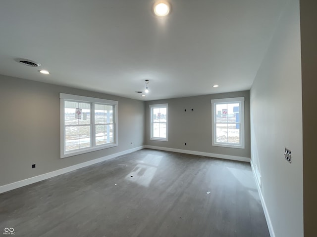 unfurnished room with dark hardwood / wood-style floors