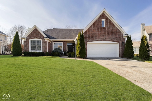 view of front of home featuring a garage and a front yard