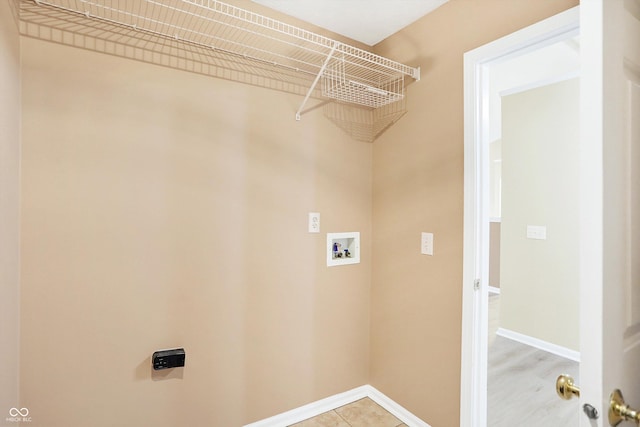 washroom featuring washer hookup and electric dryer hookup