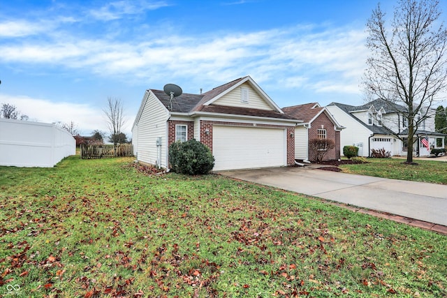 view of front facade with a garage and a front yard