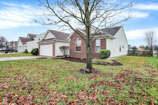 view of front of home with a front lawn and a garage