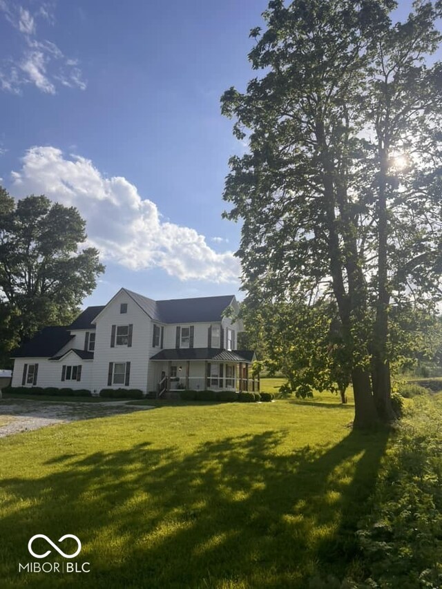 view of front of property with a front lawn