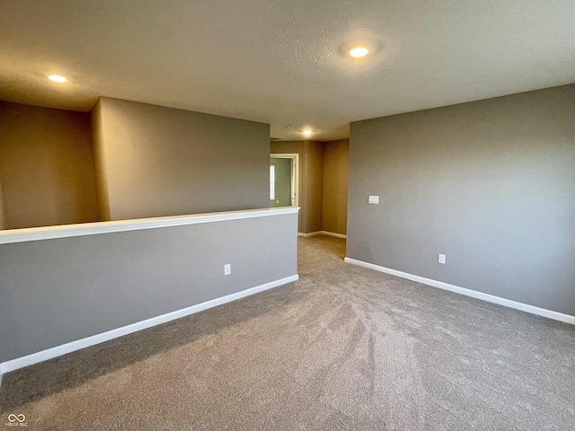 empty room featuring carpet floors