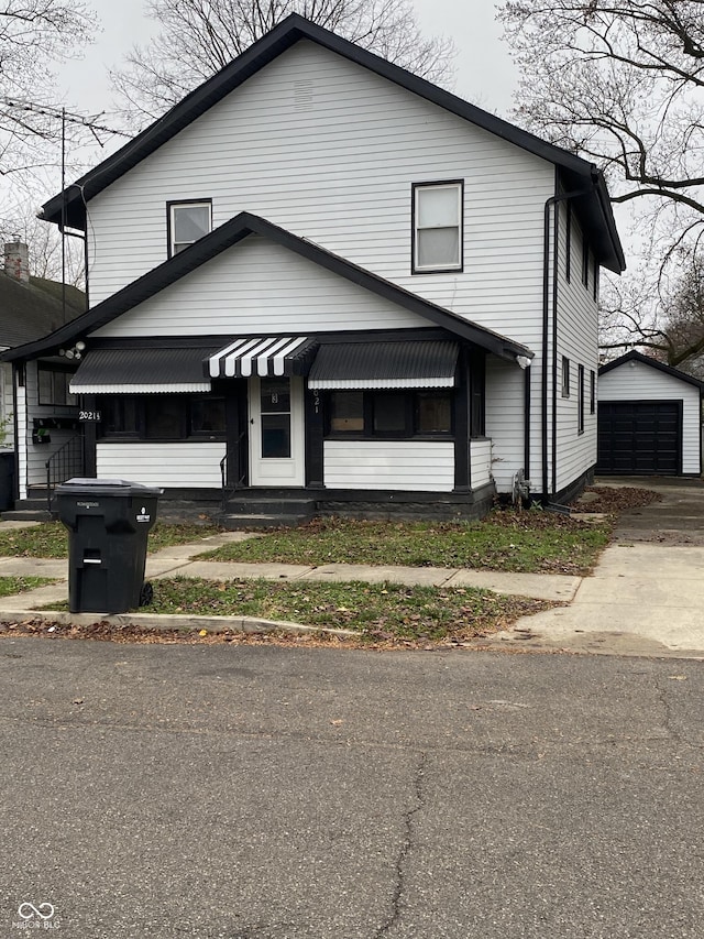 view of front of house featuring an outbuilding and a garage